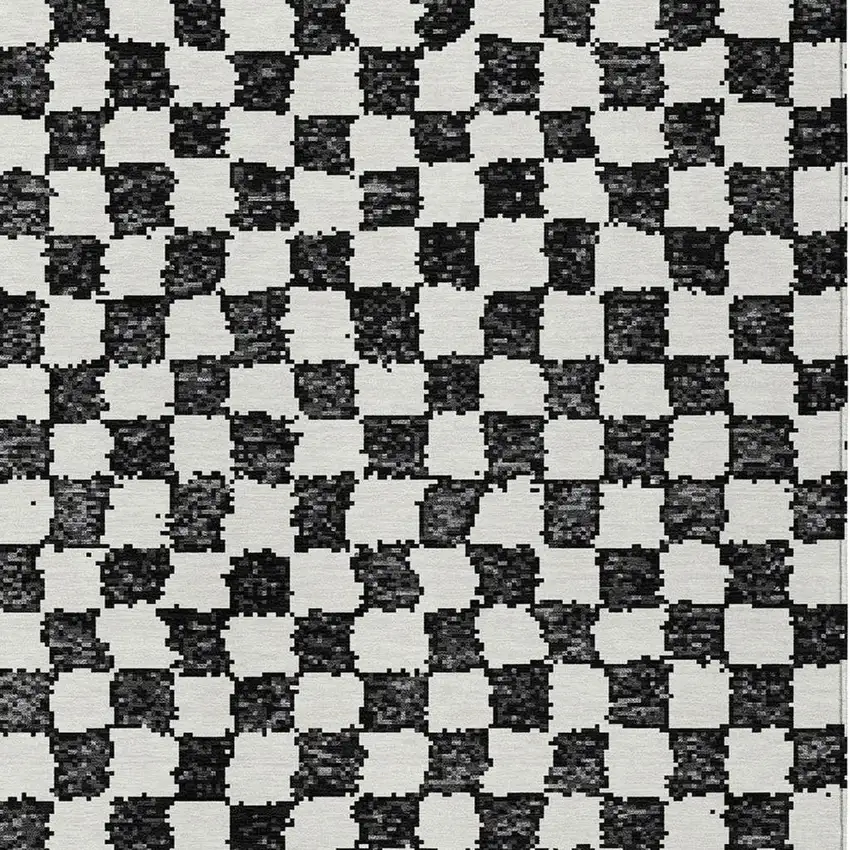 Black And Ivory Geometric Washable Indoor Outdoor Area Rug Photo 6