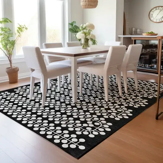 Black And Ivory Geometric Washable Indoor Outdoor Area Rug Photo 9