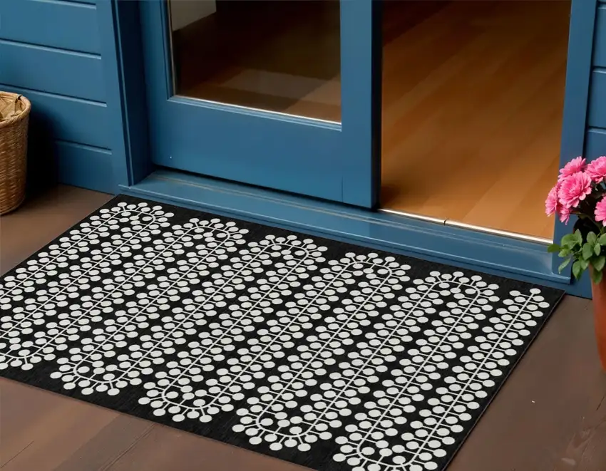 Black And Ivory Geometric Washable Indoor Outdoor Area Rug Photo 1