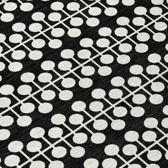 Black And Ivory Geometric Washable Indoor Outdoor Area Rug Photo 6