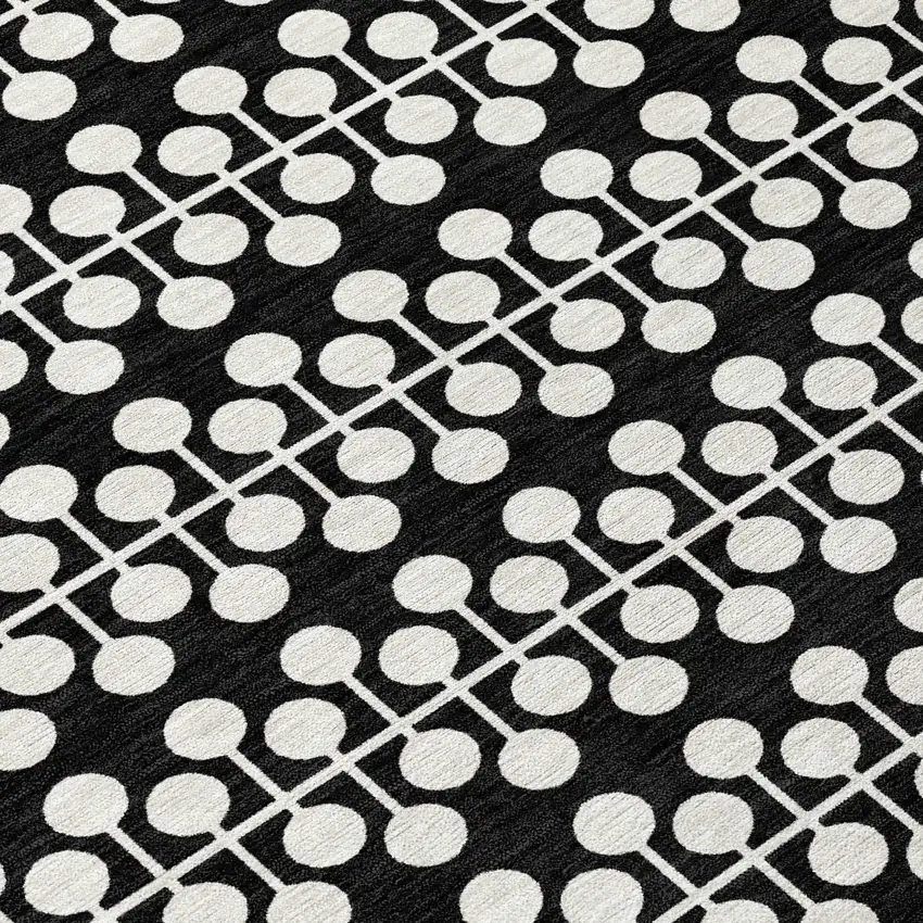 Black And Ivory Geometric Washable Indoor Outdoor Area Rug Photo 6