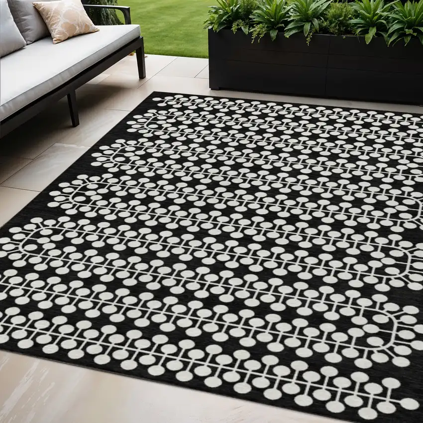 Black And Ivory Geometric Washable Indoor Outdoor Area Rug Photo 1