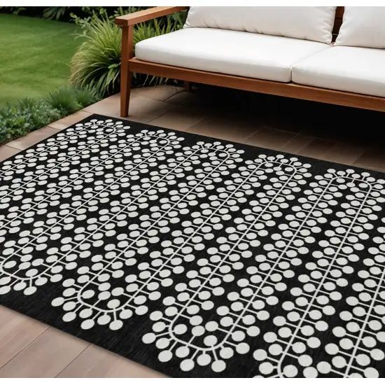 Black And Ivory Geometric Washable Indoor Outdoor Area Rug Photo 1
