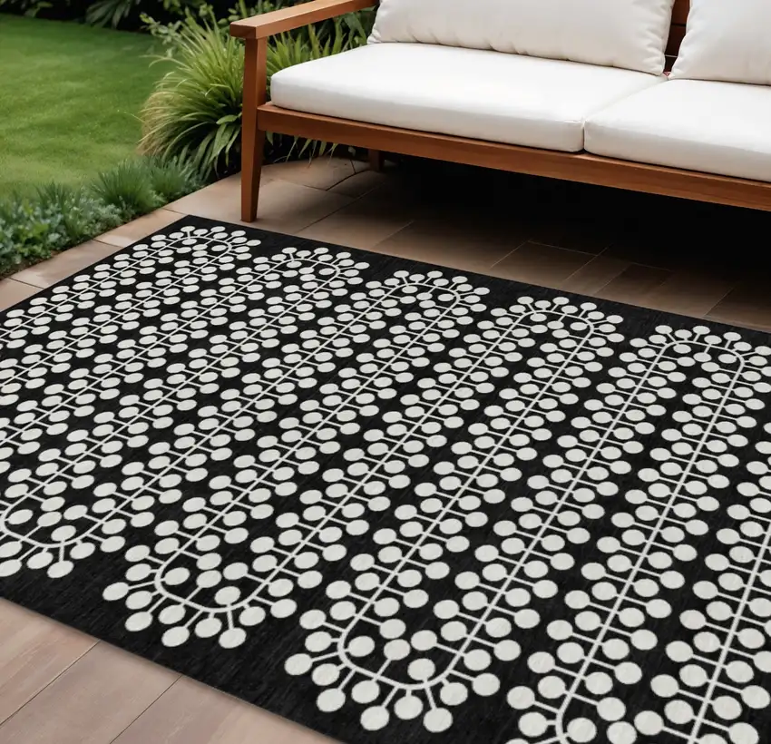 Black And Ivory Geometric Washable Indoor Outdoor Area Rug Photo 1
