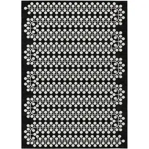 Photo of Black And Ivory Geometric Washable Indoor Outdoor Area Rug