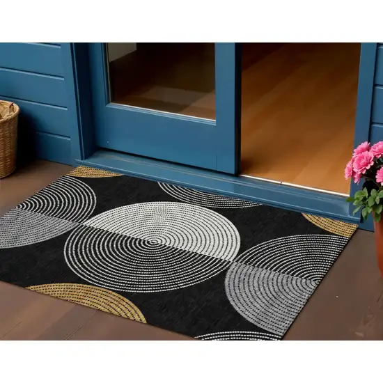 Black And Ivory Geometric Washable Indoor Outdoor Area Rug Photo 1