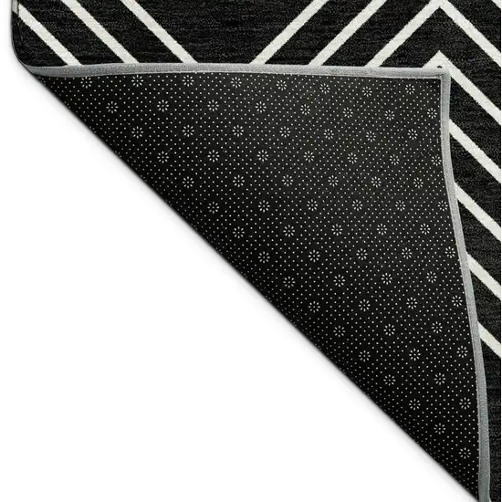 Black And Ivory Geometric Washable Indoor Outdoor Area Rug Photo 8