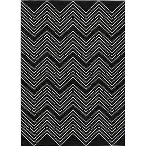 Photo of Black And Ivory Geometric Washable Indoor Outdoor Area Rug