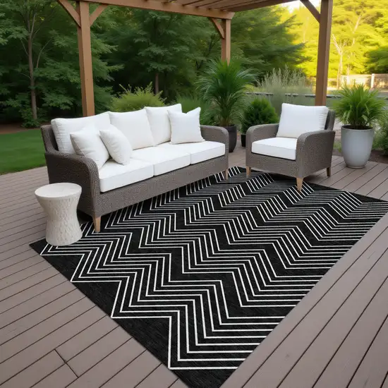Black And Ivory Geometric Washable Indoor Outdoor Area Rug Photo 6
