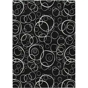 Photo of Black And Ivory Geometric Washable Indoor Outdoor Area Rug