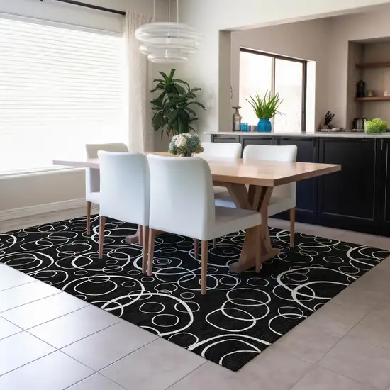 Black And Ivory Geometric Washable Indoor Outdoor Area Rug Photo 6