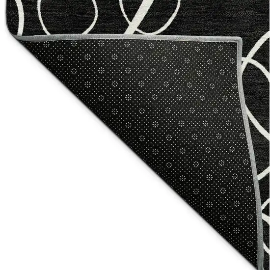 Black And Ivory Geometric Washable Indoor Outdoor Area Rug Photo 9