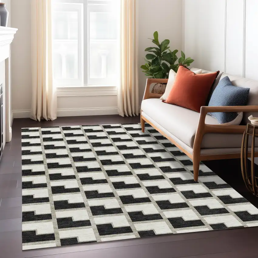 Black And Ivory Geometric Washable Indoor Outdoor Area Rug Photo 6
