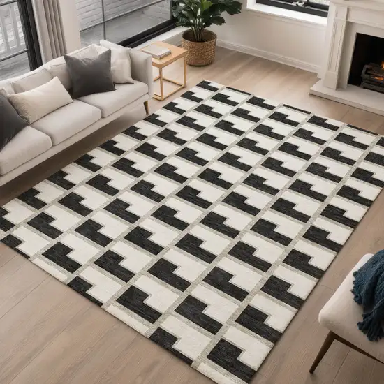 Black And Ivory Geometric Washable Indoor Outdoor Area Rug Photo 5