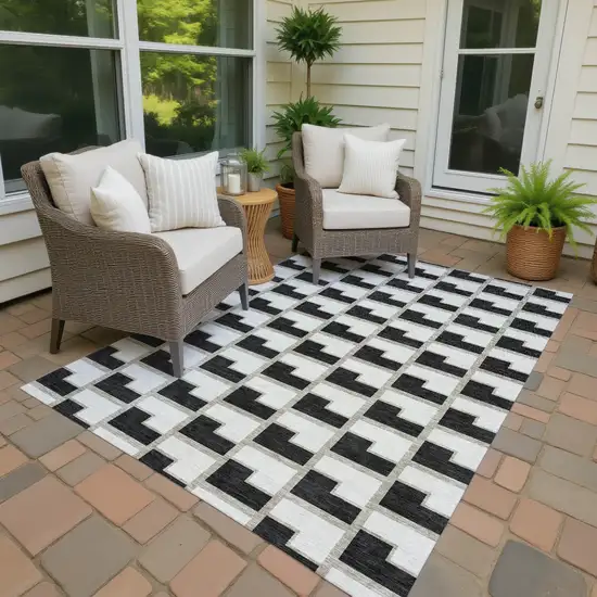 Black And Ivory Geometric Washable Indoor Outdoor Area Rug Photo 4