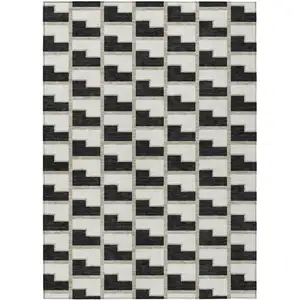 Photo of Black And Ivory Geometric Washable Indoor Outdoor Area Rug