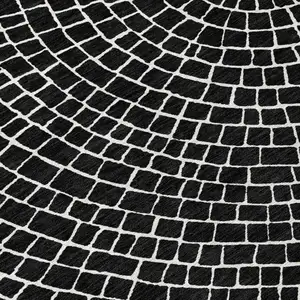 Photo of Black And Ivory Geometric Washable Indoor Outdoor Area Rug