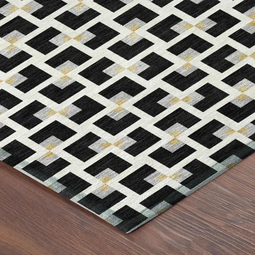Black And Ivory Geometric Washable Indoor Outdoor Area Rug Photo 4
