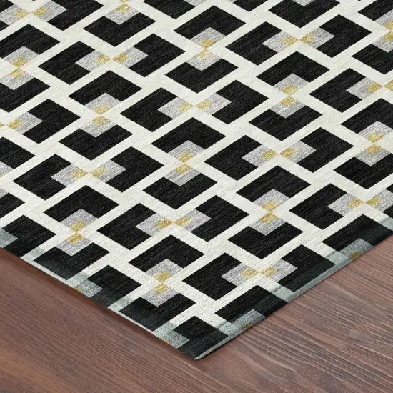 Black And Ivory Geometric Washable Indoor Outdoor Area Rug Photo 4