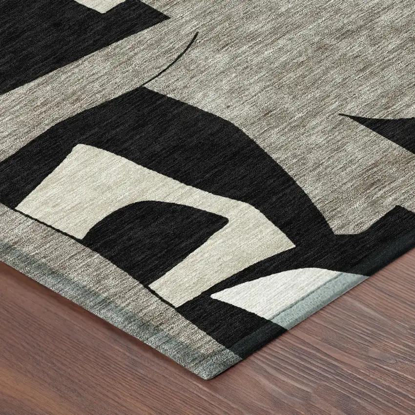 Black And Ivory Geometric Washable Indoor Outdoor Area Rug Photo 5