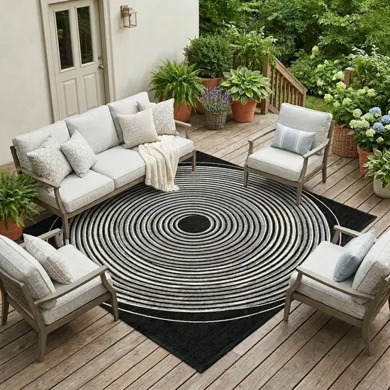 Black And Ivory Geometric Washable Indoor Outdoor Area Rug Photo 1
