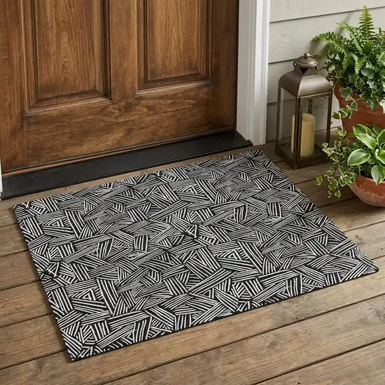 Black And Ivory Geometric Washable Indoor Outdoor Area Rug Photo 1