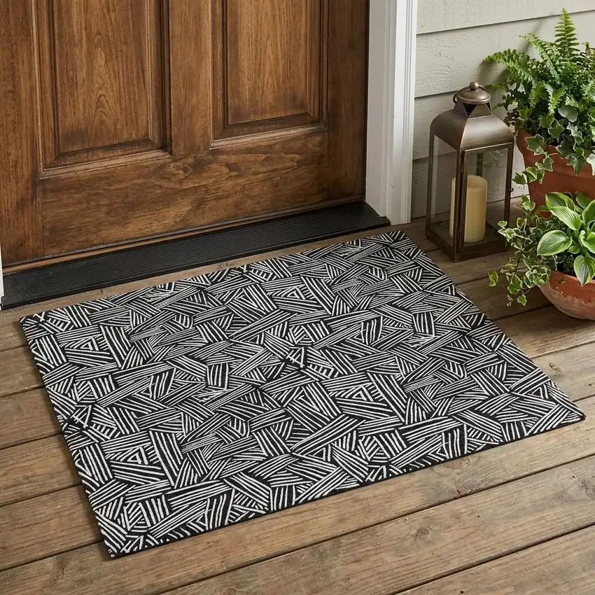 Black And Ivory Geometric Washable Indoor Outdoor Area Rug Photo 1