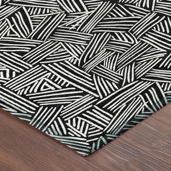 Black And Ivory Geometric Washable Indoor Outdoor Area Rug Photo 7
