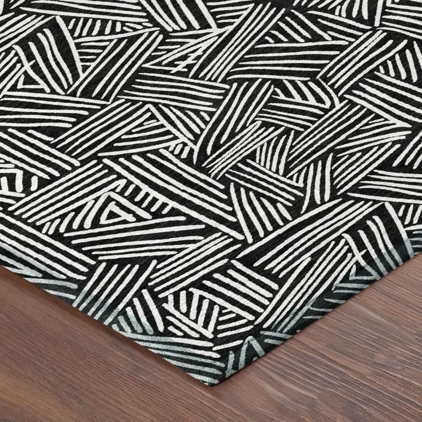 Black And Ivory Geometric Washable Indoor Outdoor Area Rug Photo 7