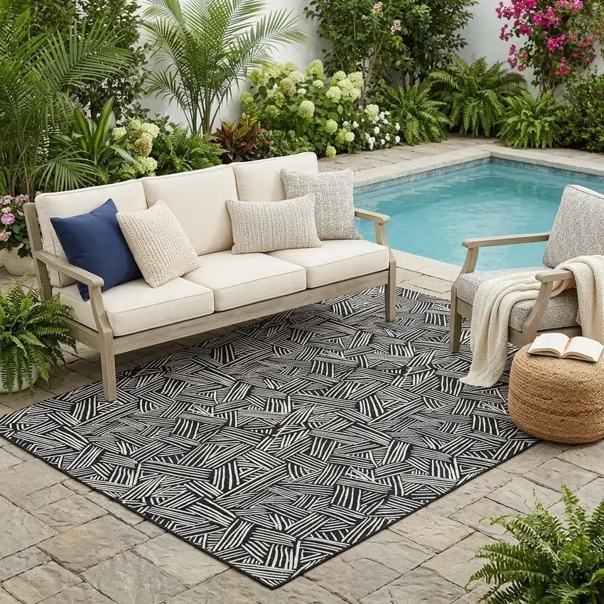 Black And Ivory Geometric Washable Indoor Outdoor Area Rug Photo 1