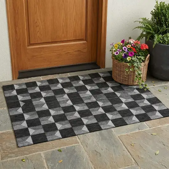 Black And Ivory Geometric Washable Indoor Outdoor Area Rug Photo 1