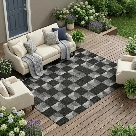 Black And Ivory Geometric Washable Indoor Outdoor Area Rug Photo 1