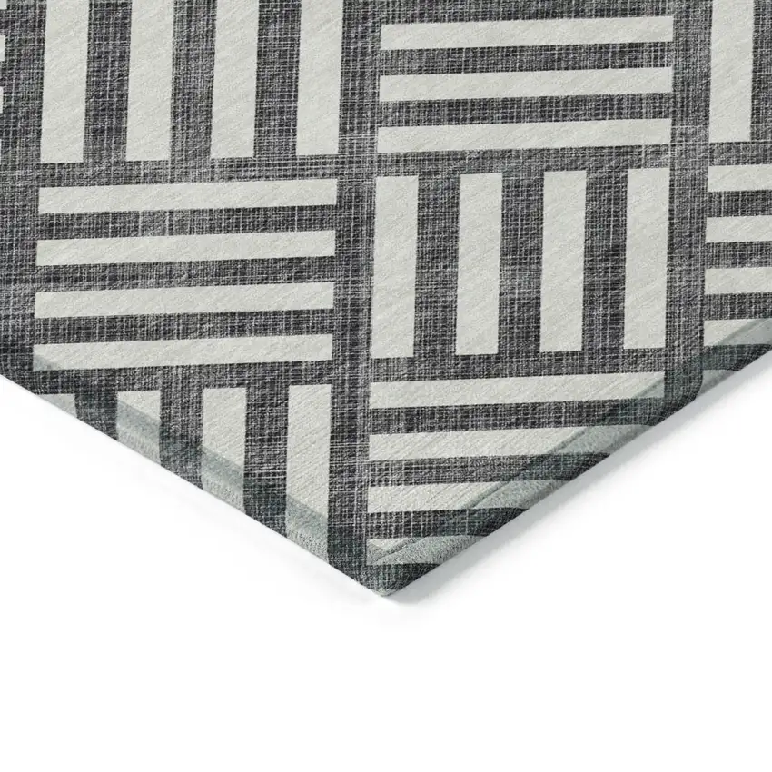 Black And Ivory Geometric Washable Indoor Outdoor Area Rug Photo 4
