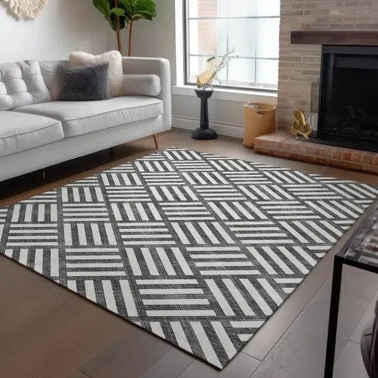 Black And Ivory Geometric Washable Indoor Outdoor Area Rug Photo 9
