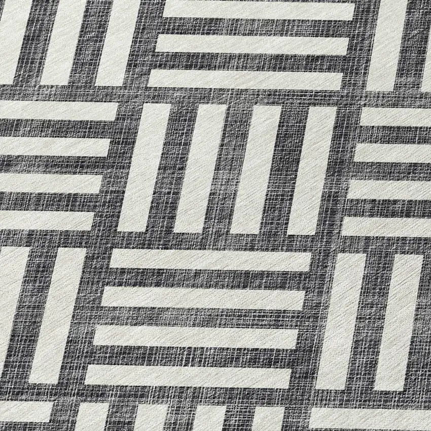 Black And Ivory Geometric Washable Indoor Outdoor Area Rug Photo 5