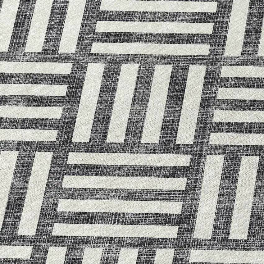 Black And Ivory Geometric Washable Indoor Outdoor Area Rug Photo 5