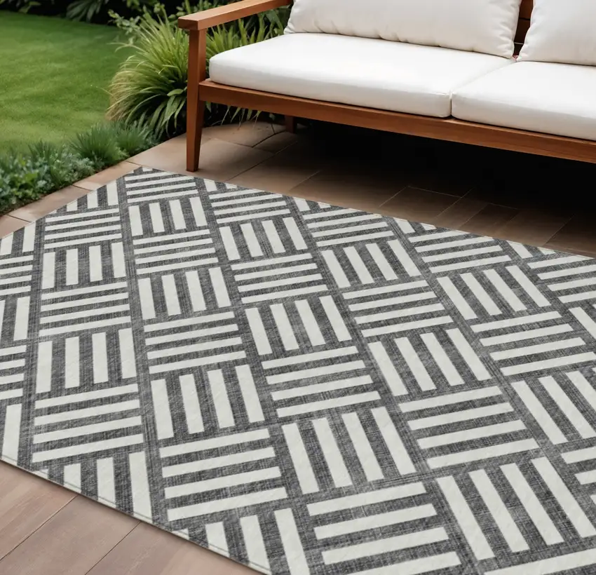 Black And Ivory Geometric Washable Indoor Outdoor Area Rug Photo 1