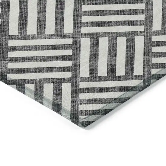 Black And Ivory Geometric Washable Indoor Outdoor Area Rug Photo 4