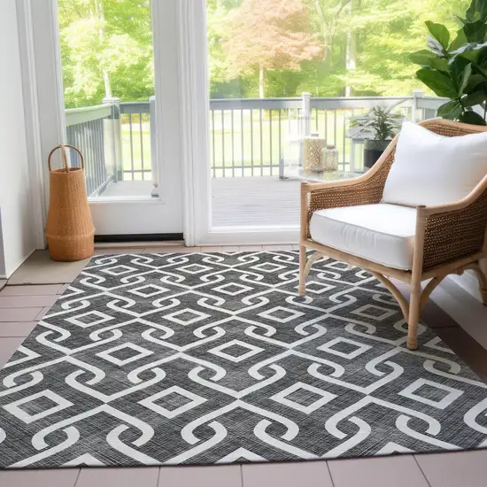 Black And Ivory Geometric Washable Indoor Outdoor Area Rug Photo 9