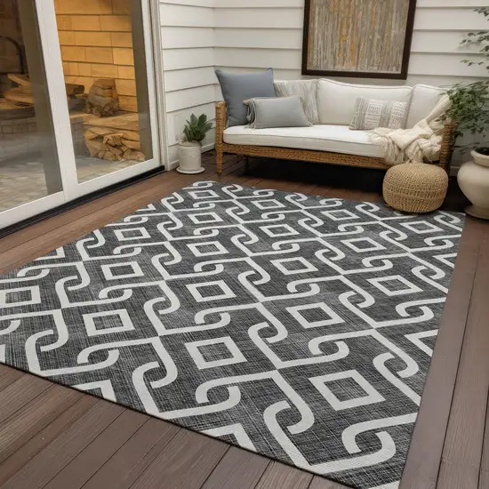Black And Ivory Geometric Washable Indoor Outdoor Area Rug Photo 9