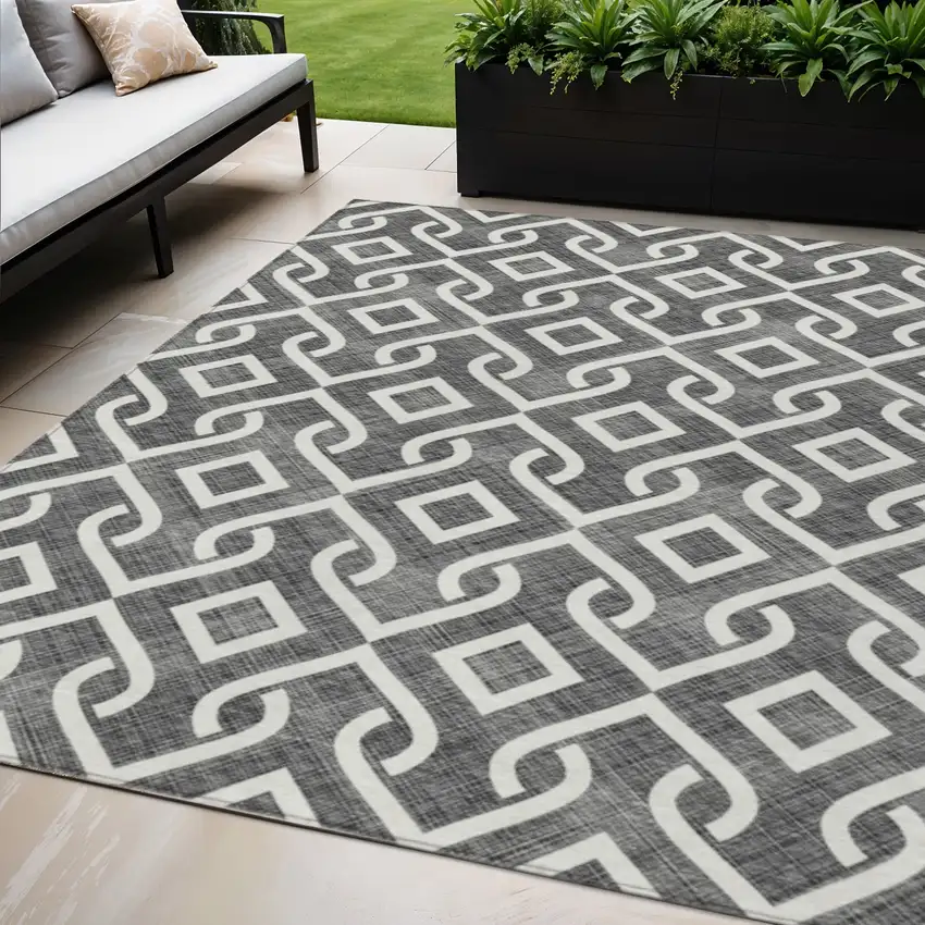 Black And Ivory Geometric Washable Indoor Outdoor Area Rug Photo 1