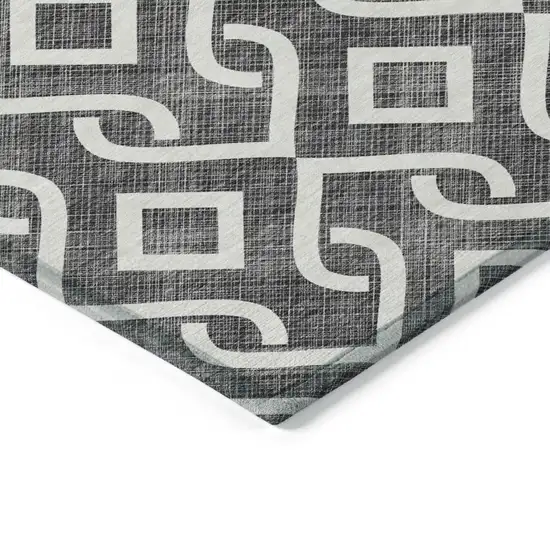 Black And Ivory Geometric Washable Indoor Outdoor Area Rug Photo 4