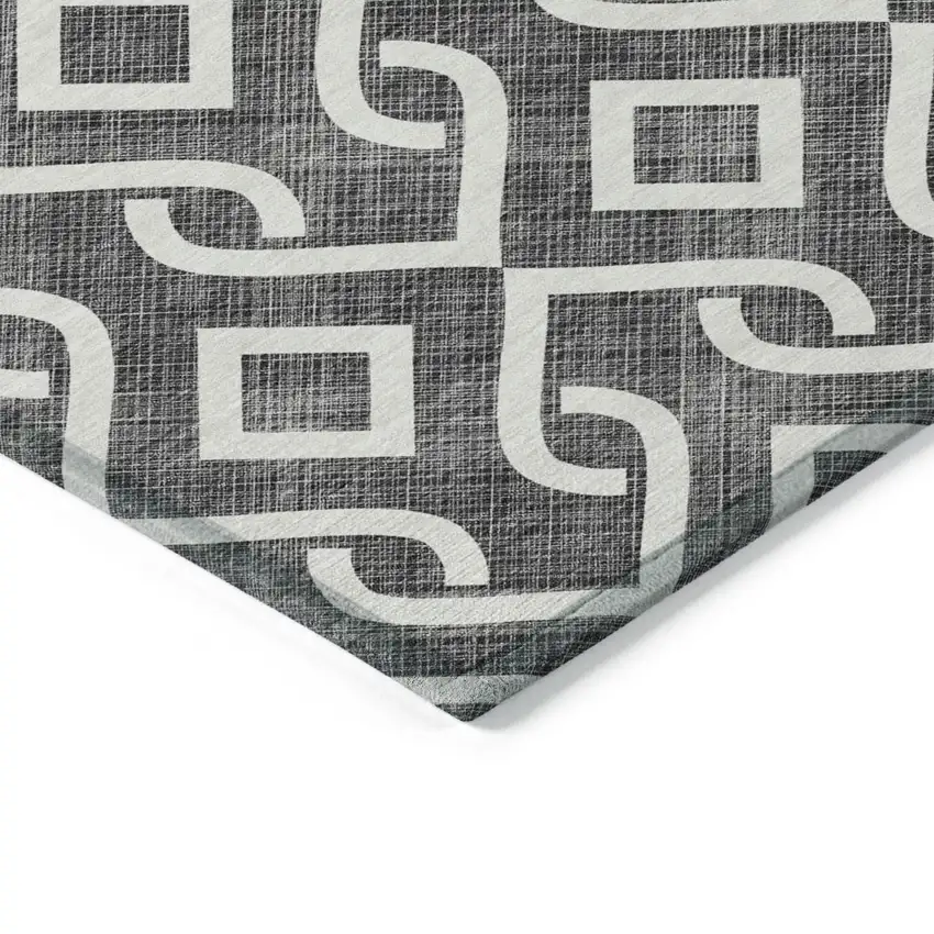 Black And Ivory Geometric Washable Indoor Outdoor Area Rug Photo 4