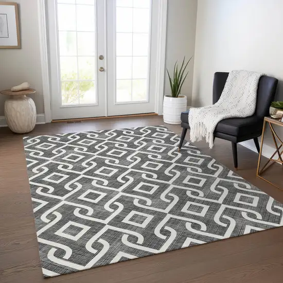 Black And Ivory Geometric Washable Indoor Outdoor Area Rug Photo 8