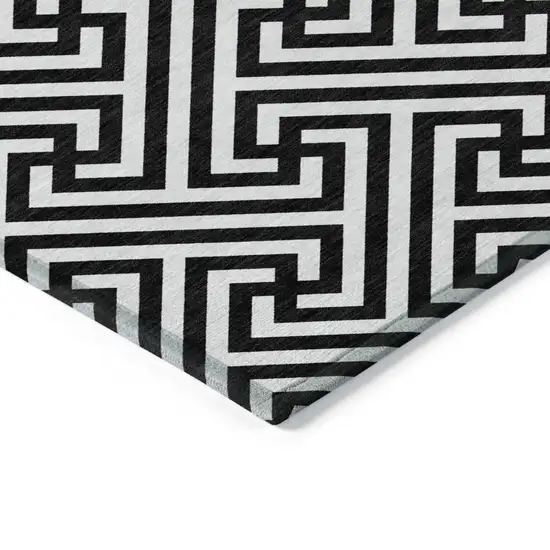 Black And Ivory Geometric Washable Indoor Outdoor Area Rug Photo 4