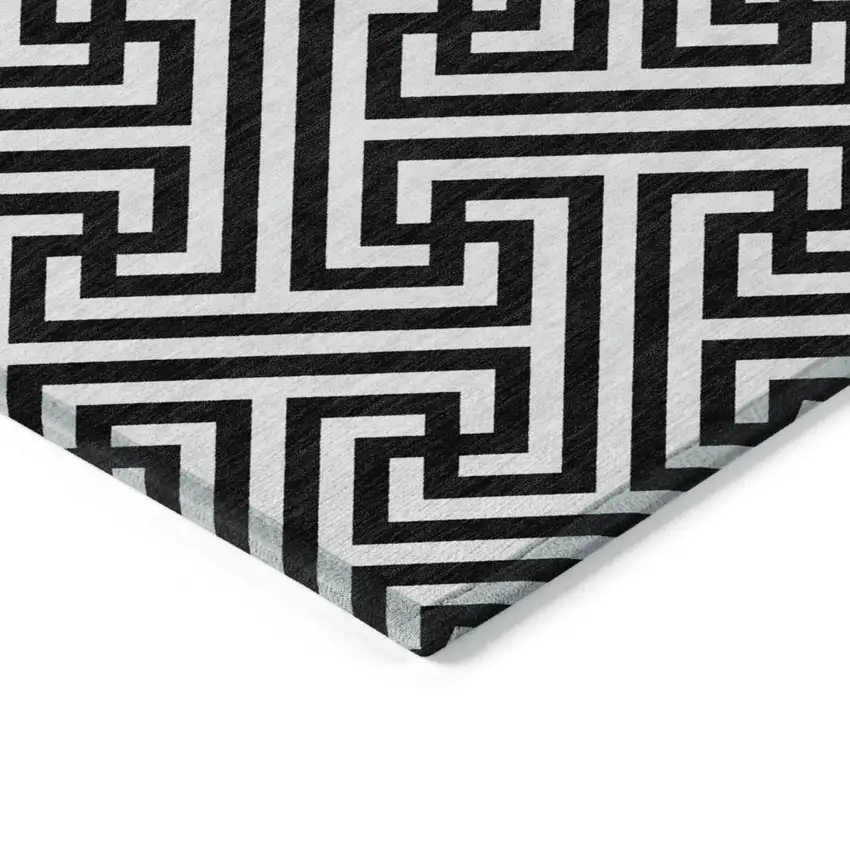 Black And Ivory Geometric Washable Indoor Outdoor Area Rug Photo 4