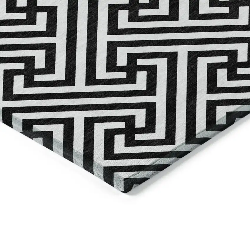 Black And Ivory Geometric Washable Indoor Outdoor Area Rug Photo 4