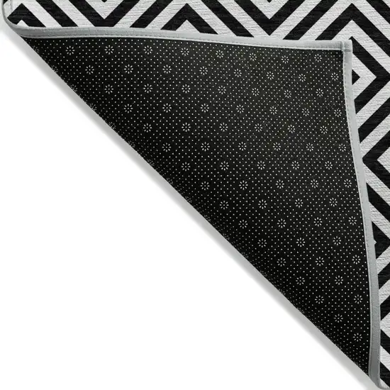 Black And Ivory Geometric Washable Indoor Outdoor Area Rug Photo 3