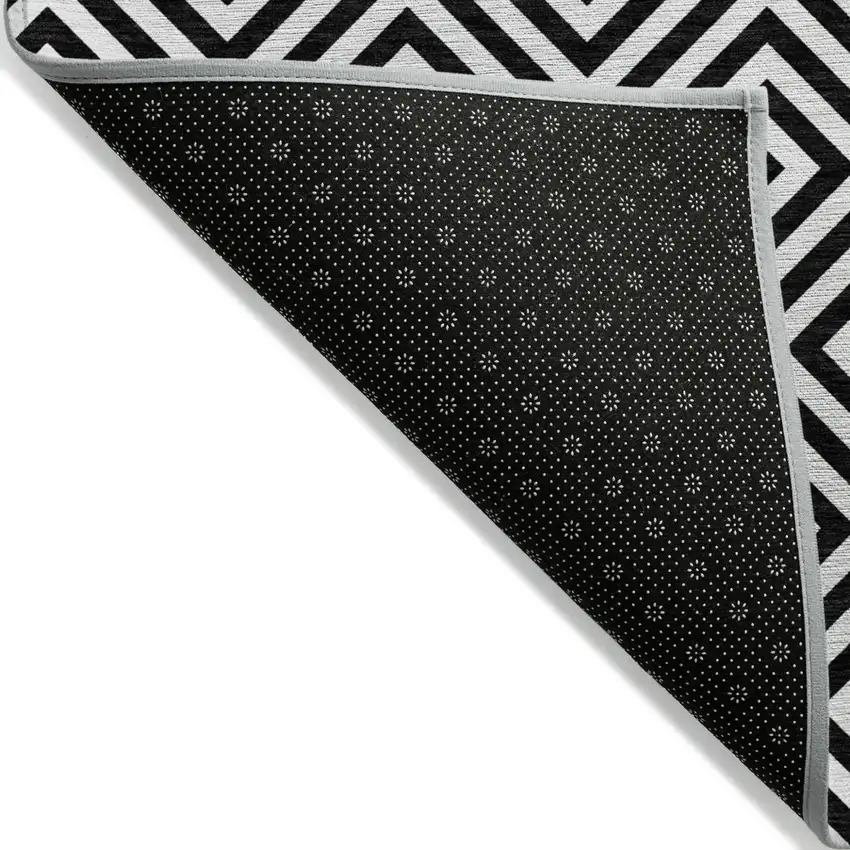 Black And Ivory Geometric Washable Indoor Outdoor Area Rug Photo 3
