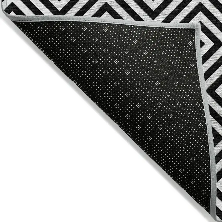 Black And Ivory Geometric Washable Indoor Outdoor Area Rug Photo 3